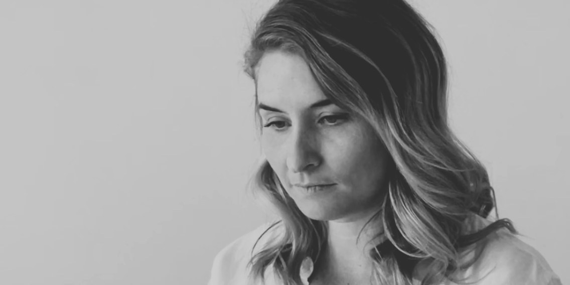 A neurodivergent business owner thinking through her workload - on how ADHD business owners actually stay organised
