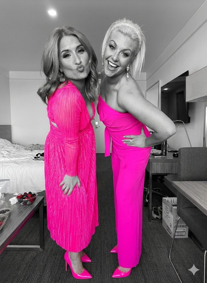 Mia and Kristen, founders of Hive Hub Collective, in matching hot pink
